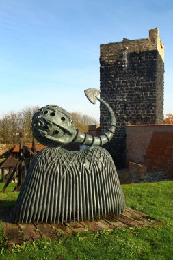 Cheb, Czech Republic - November 3,2024: The bronze sculpture Sepia by Czech sculptor Jaroslav Rona in Cheb Castle, a fortress above the river Eger in the town of Cheb in the western Czech Republic. clipart