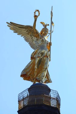 Berlin, Germany - July 9, 2024: View of Victory Column, 67m-high gilded column commemorating victory in the Prussian-Danish war, with a deck for city views clipart