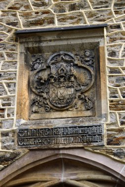 Schneeberg, Germany - March 26, 2024: Detail of St. Wolfgang church in Schneeberg, a historical mining town in the Ore Mountains, Saxony, Germany clipart