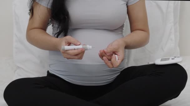Close Pregnant Woman Checking Blood Sugar Level Herself Glucose Meter — Stock Video