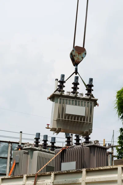 Crane Hook Lifts Distribution Transformer — Stock Photo, Image