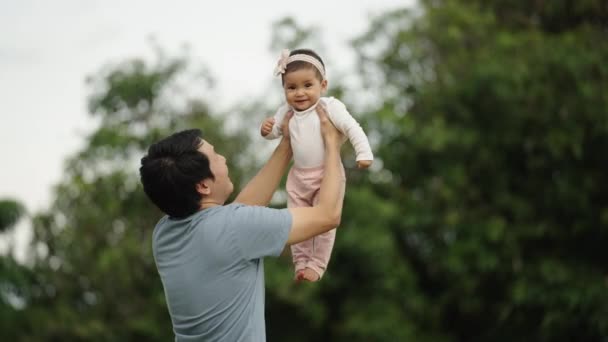 Father Holding Lifting His Infant Baby Park — Video