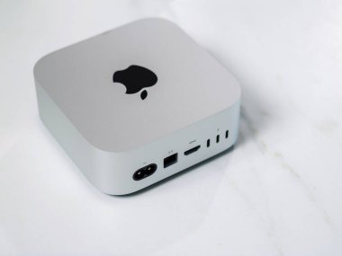 BANGKOK, THAILAND - NOV 14, 2024 : New Apple Mac Mini (2024). Latest Mac Mini model has been downsized to a 5-inch square, featuring the powerful M4 and M4 Pro Chip for integrated Apple Intelligence. clipart