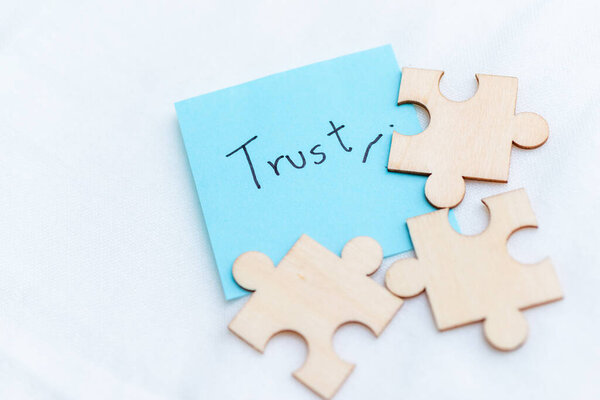 Building business trust a puzzle of relationships office space visual content professional environment close-up connection concept