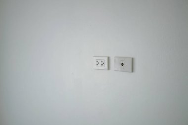 Discover the simple steps for installing electrical outlets in your minimalist home environment.