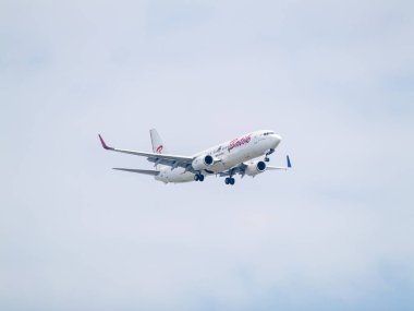 Bangkok, Tayland-26 Aralık 2024: Tayland 'da yurt içi havayolları sergilenen Donmueang Havalimanı' na inmek için bir uçak yaklaşıyor.