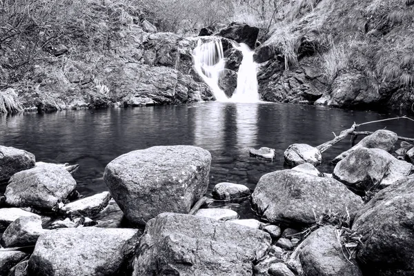 Stream in mountain, black and white