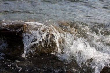 Beautiful sea waves with seashore.