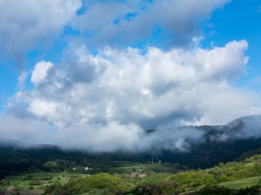 Beautiful mountain scenery with clouds.