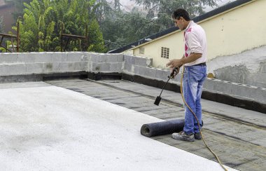 düz çatı onarım kaplama çatı keçe ile çalışır