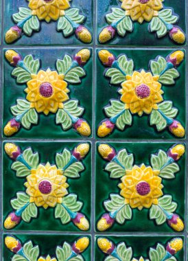 Traditional green and yellow ornate portuguese decorative tiles azulejos