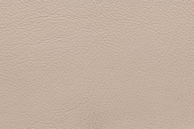 Lüks klasik arka plan olarak kullanılan bej deri dokular. Taklit, yapay deri dokusu arka planı. Soyut