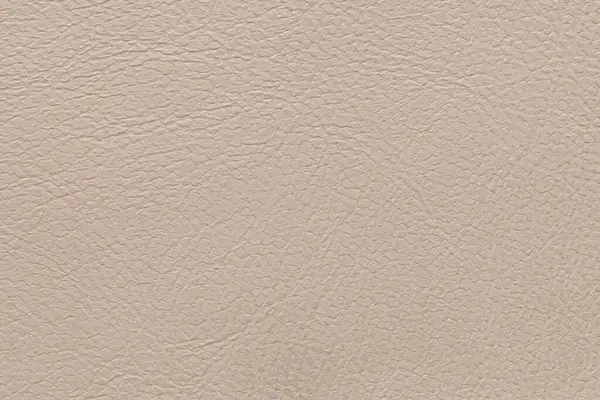 Lüks klasik arka plan olarak kullanılan bej deri dokular. Taklit, yapay deri dokusu arka planı. Soyut