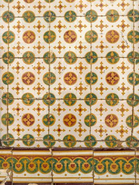 Traditional green and yellow ornate portuguese decorative tiles azulejos