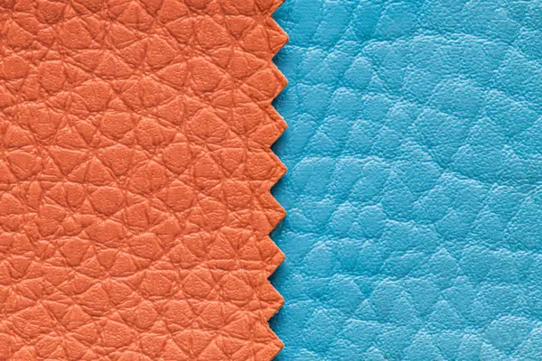 Orange and blue leather texture used as luxury classic Background. Imitation artificial leather texture background. Abstract