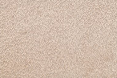Bej taklidi yapay deri doku arka planı. Soyut