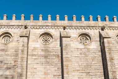 Wall of the Cathedral Dated in the XII Century Dedicated to the Virgin Mary in Evora, Portugal clipart