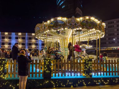 MAIA, PORTUGAL - DECEMBER 16, 2023 Christmas decorations on the city streets. Half a million LED lamps illuminate Maia this Christmas clipart