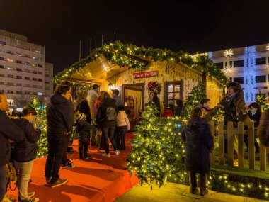 MAIA, PORTUGAL - DECEMBER 16, 2023 Christmas decorations on the city streets. Half a million LED lamps illuminate Maia this Christmas clipart