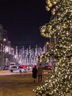 MAIA, PORTUGAL - DECEMBER 16, 2023 Christmas decorations on the city streets. Half a million LED lamps illuminate Maia this Christmas clipart