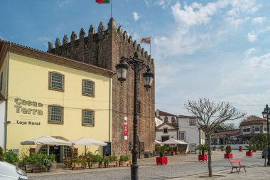 PONTE DE LIMA, PORTUGAL - 18 APRIL 2018: Riverside of Ponte de Lima village in Portugal clipart