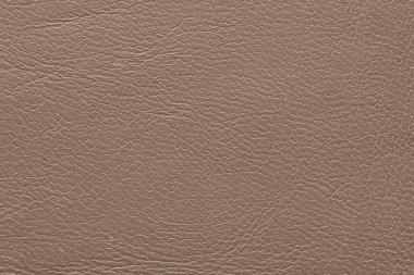 Döşeme veya giysi için uygun desenli yüzeyi olan kahverengi deri..