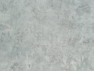 Ses tonu ve deseninde ince değişikliklere sahip desenli gri bir yüzey ürünleri veya tasarımları sergilemek için ideal, çok yönlü ve modern bir zemin oluşturur.