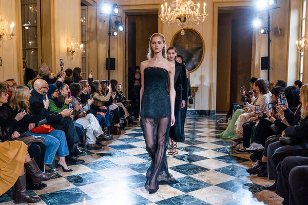 MILAN, ITALY - FEBRUARY 25: Models walk the runway finale at the Ermanno Scervino fashion show during the Milan Fashion Week Womenswear Fall/Winter 2023/2024 on February 25, 2023 in Milan, Italy.