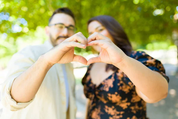 Focus Foreground Loving Young Couple Looking Happy Making Heart Love — Stock Photo, Image