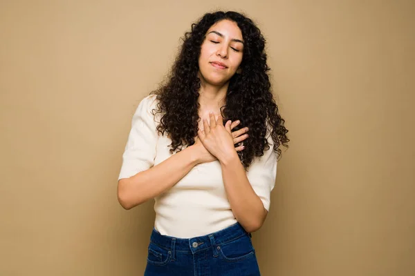 Attractive Latin Woman Her Hands Her Heart Chest Feeling Love — Stockfoto