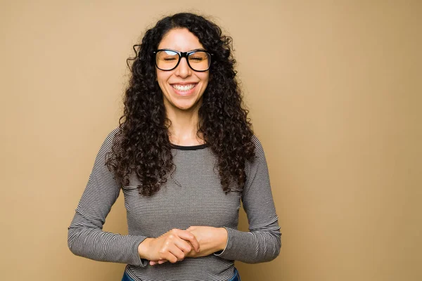 Excited Hispanic Young Woman Wearing Glasses While Laughing Having Fun — Foto de Stock