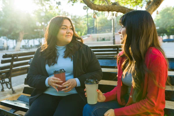 Hispanic Young Women Friends Talking While Hanging Out Park Enjoying — Stok fotoğraf