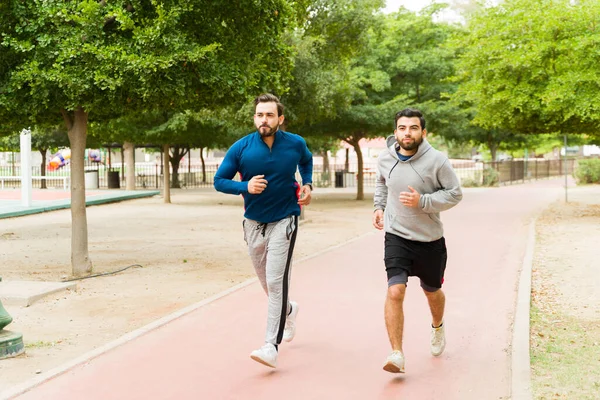 Full Length Young Men Friends Fitness Active Lifestyle Park Running — Fotografia de Stock