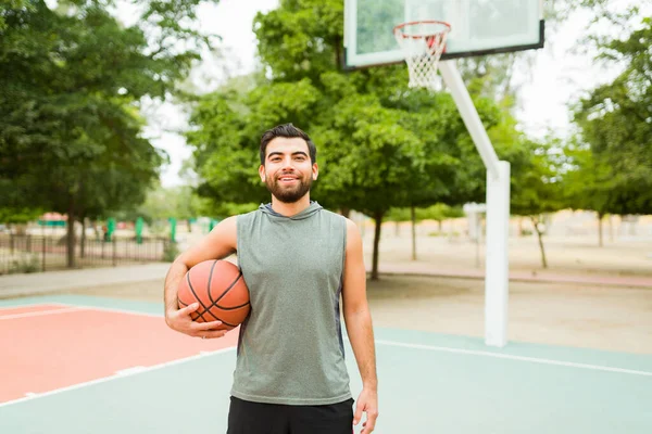 Portrait Happy Latin Man Smiling Park While Holding Ball Play — Stok fotoğraf