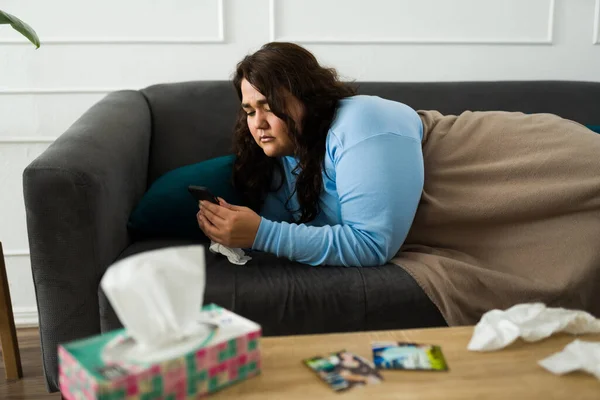 Upset Sad Woman Waiting Text Message Smartphone Lying Sofa Missing — Stock Photo, Image
