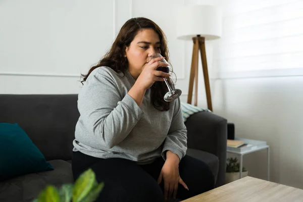 Latin Fat Woman Drinking Wine Looking Tired Sad While Feeling — Stock Photo, Image