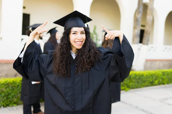 Caucasian Excited Woman Pointing Her Graduation Cap Graduating University Feeling — Fotografia de Stock