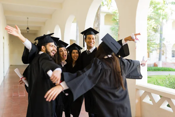 Excited Group Friends Hugging Together Smiling Looking Happy Receiving College — Fotografia de Stock