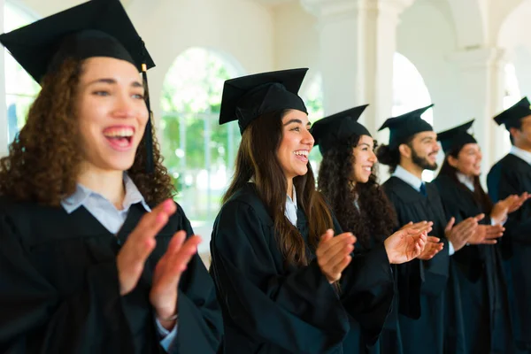Happy Women Graduates Friends Clapping Excited Graduation Ceremony Receiving College — Fotografia de Stock