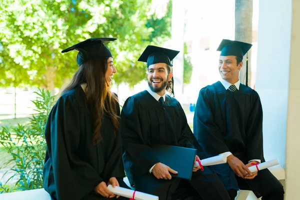 Cheerful Latin Man Smiling While Talking His Friends Graduation Ceremony — Fotografia de Stock