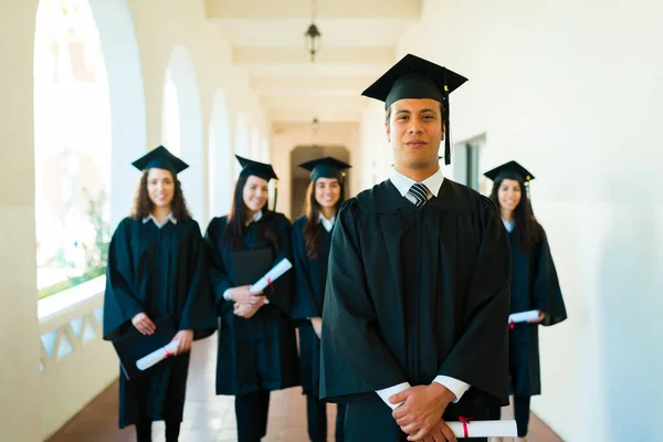 Handsome Hispanic Man Graduating Standing His Friends Campus Finishing College — Fotografia de Stock