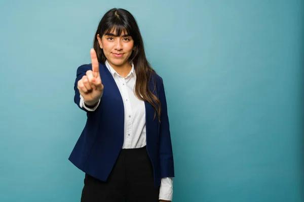 Smart Confident Young Woman Showing Her Index Finger Because Her —  Fotos de Stock