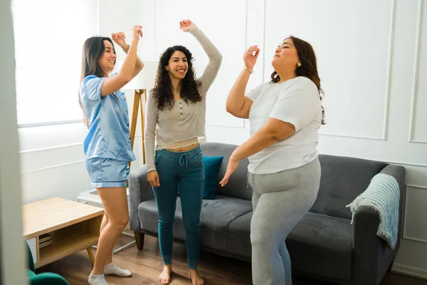 Hispanic Female Friends Pajamas Dancing Listening Happy Fun Music Having — Foto Stock