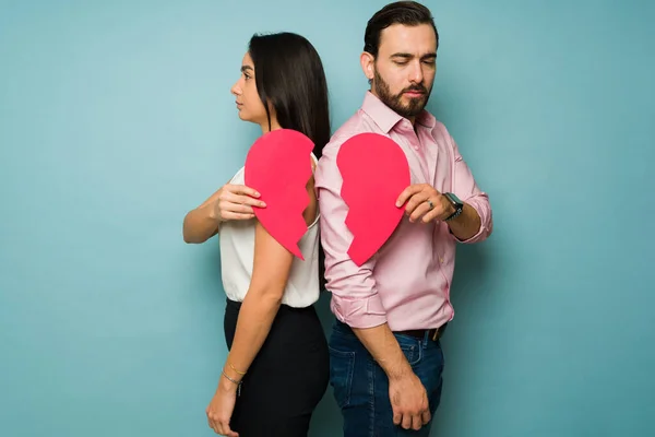 Angry Attractive Couple Feeling Heartbroken Turning Backs Holding Red Broken — Stock Photo, Image