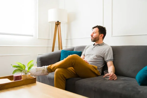 Lonely Caucasian Man Relaxing Home Sitting Sofa Drinking Alcohol While — Stock Photo, Image