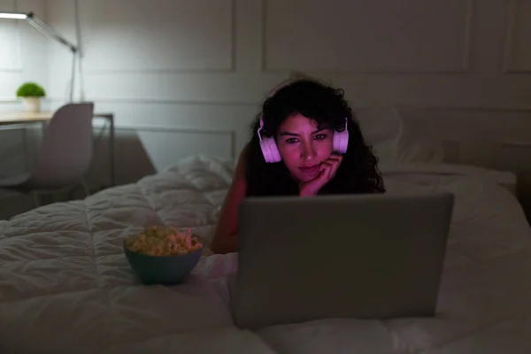 Relaxed Young Woman Headphones Watching Movie Laptop While Relaxing Bed — Stock Photo, Image