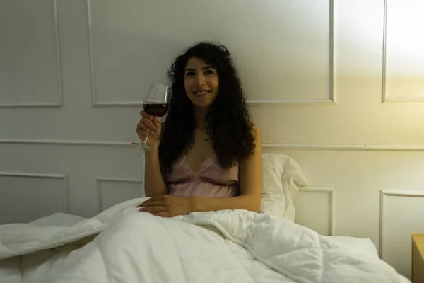 Happy Latin Young Woman Pajamas Smiling While Drinking Glass Wine — Stock Photo, Image