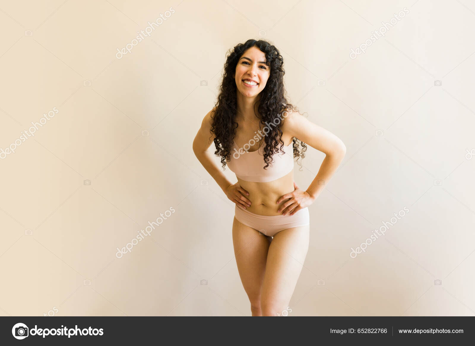 Fun Young Woman Curly Hair Enjoying Her Body Wearing Underwear Stock Photo  by ©tonodiaz 652822766