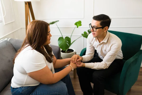 Concerned Man Therapist Comforting Holding Hands Sad Woman Patient Lot — Stock Photo, Image