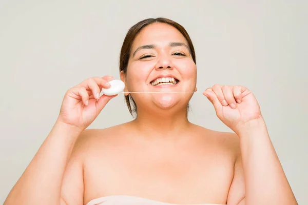 Cheerful Overweight Woman Her 30S Flossing Her Teeth Smiling White — Stock Photo, Image